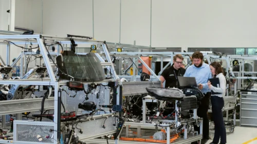 Image of a car production line.